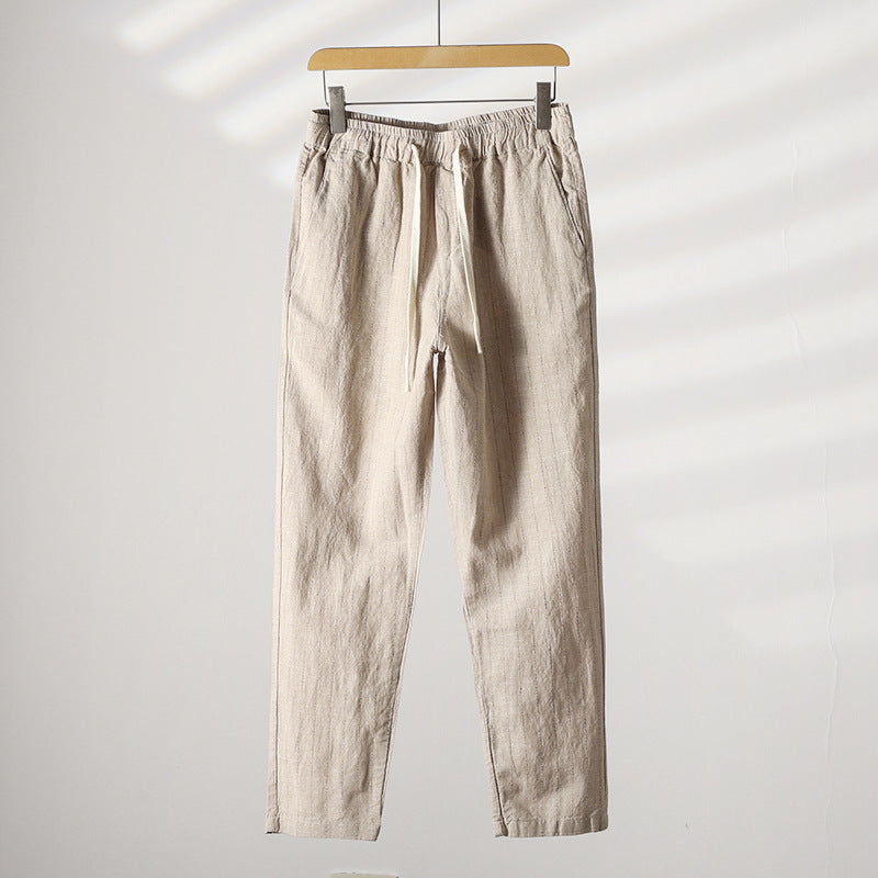 Calça de Linho Listrada Masculina Vonluthen VL008, feita em linho nobre, com estampa clássica e modelagem refinada, ideal para eventos sociais e casuais.